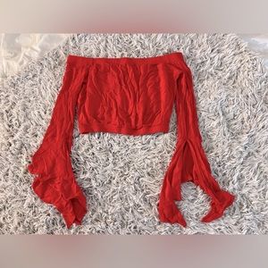 Red crop top with bell sleeves & slits